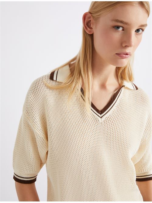 The cool alternative to the shirt has become the season's most versatile piece: pair it with casual trousers and wear it as either a base layer or under a poplin shirt. MARELLA SPORT | 2613361044200006